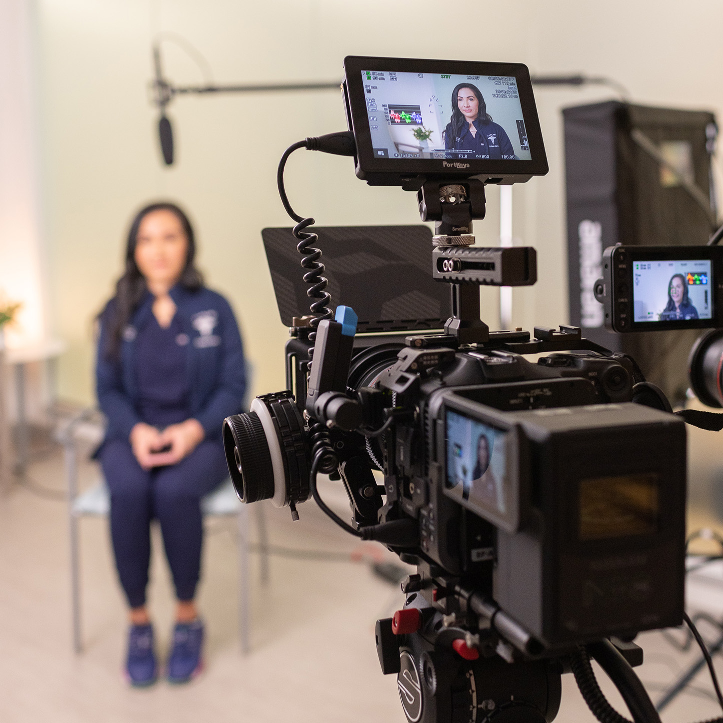 Shore Point Productions filming a healthcare professional interview with cinema cameras in a clinical setting