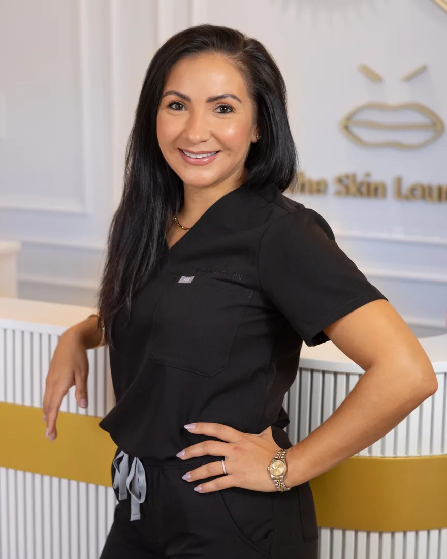 Aesthetics provider photographed at a reception desk