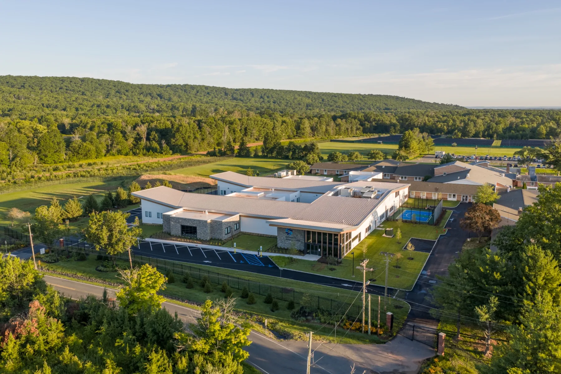 Aerial brand photograph of a large healthcare facility and landscaped property