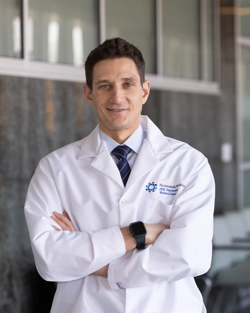 Physician in a white coat photographed at a medical center